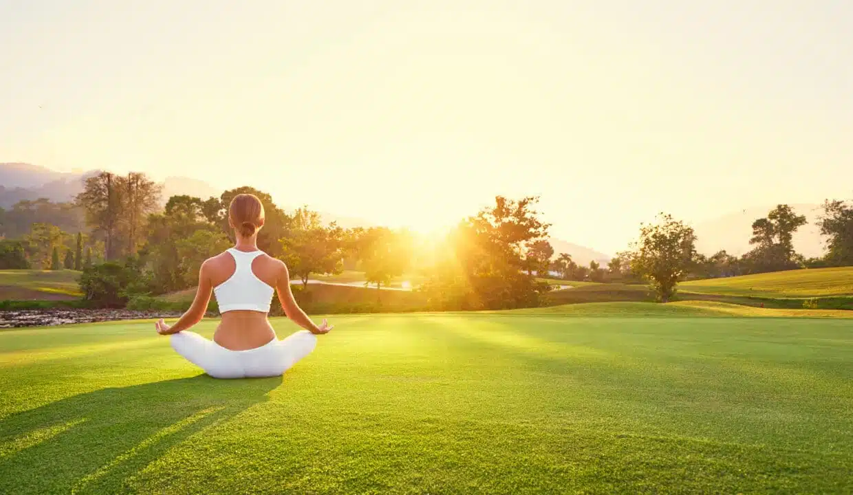 Yoga,At,Park,With,View,Of,The,Mountains,,With,Sunlight.