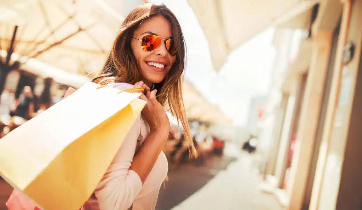 Woman,In,Shopping.,Happy,Woman,With,Shopping,Bags,Enjoying,In